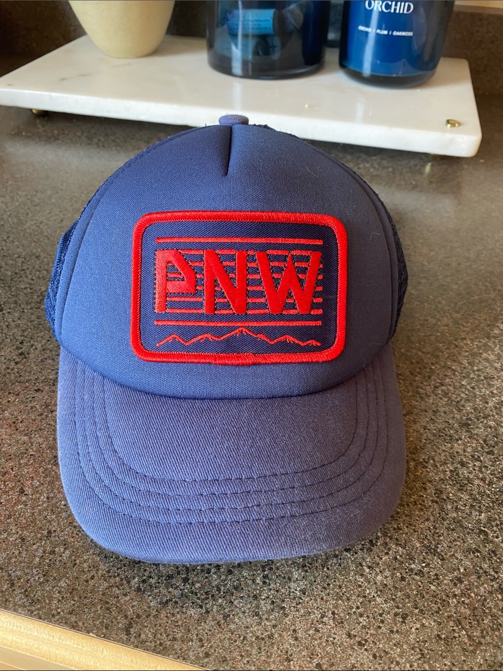 Kids Navy Blue Trucker Hat with Red PNW Patch